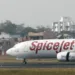 A SpiceJet passenger plane moves on the runway at the Sardar Vallabhbhai Patel international airport in Ahmedabad January 8, 2014. REUTERS/Amit Dave/Files